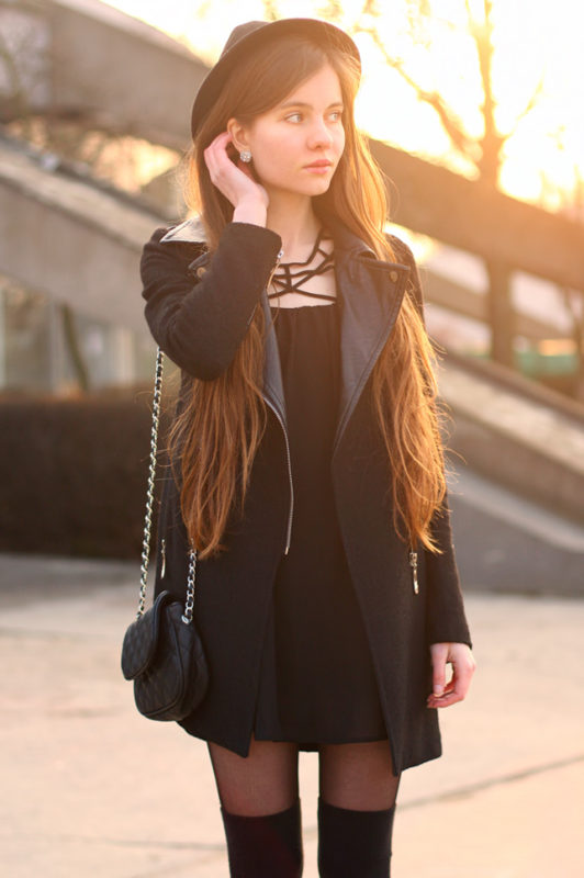 Simple-black-dress-with-a-black-coat-and-knee-high-socks.