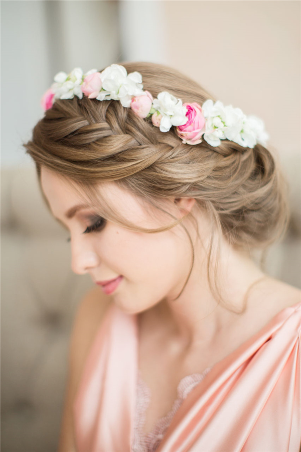 braided-wedding-hairstyle-witn-pastel-flower-crown