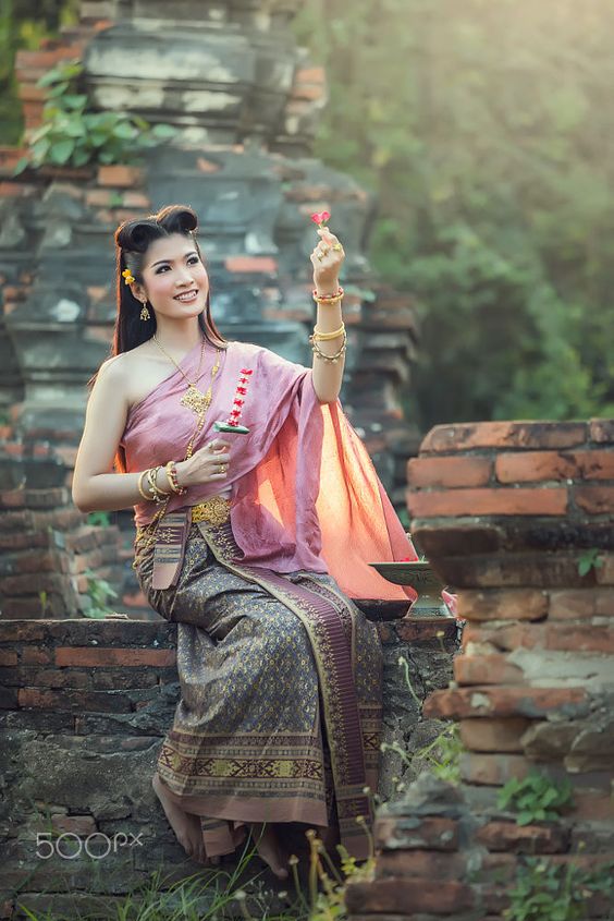 Asian Women at Thailand traditional dress in Ayutthaya historical park